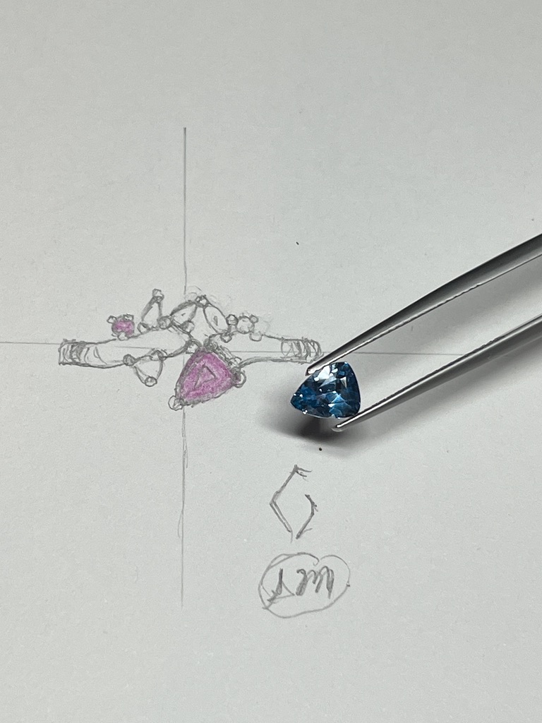 sketch with pink or blue trilliant sapphire